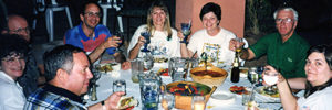 A happy group toasts to REP over dinner near Tucson at its second annual meeting in 1998. Counter-clockwise from left: Sam and Laurie Booher (GA), Chester Sansbury (SC), Jim DiPeso (WA), Kathy Roediger (AZ), Martha Marks (IL), Bob Eidesmoe (AZ), and Tamilyn Sanderson (MI).