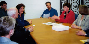 REP leaders Aurie Kryzuda (l), Martha Marks (c), and Kathy Roediger (r) meet with John McCain, his wife Cindy, and his staff in January 2000.