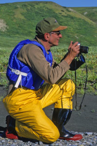 Jim DiPeso with his camera in the Arctic National Wildlife Refuge
