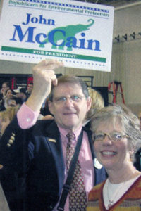 First Selectman Woody Bliss of Weston, CT, REP's Connecticut Coordinator, hoists a REP-branded sign for McCain at a rally in his town.